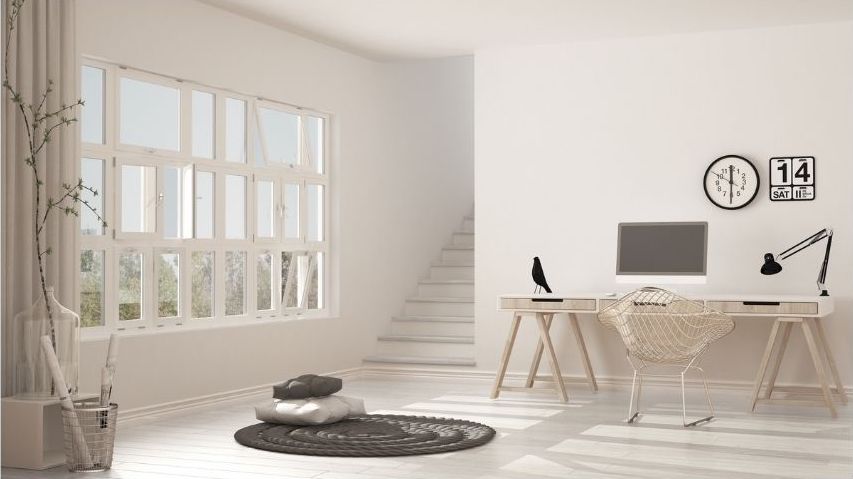 Minimalist landing area with desk and computer in Knightsbridge.
